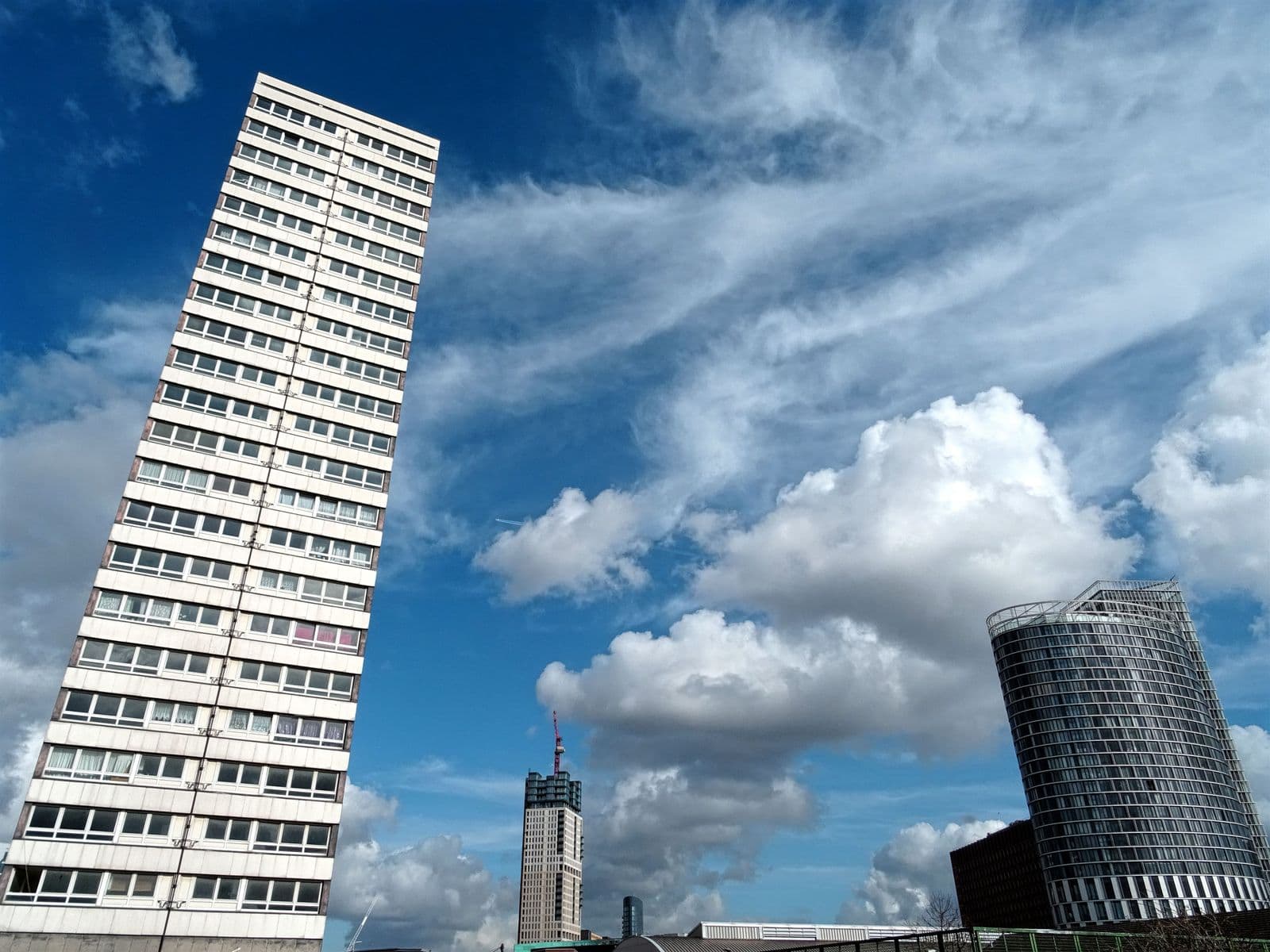 A single tall tower standing against an open sky